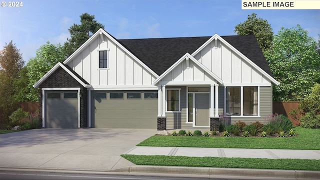 view of front facade featuring a front lawn and a garage