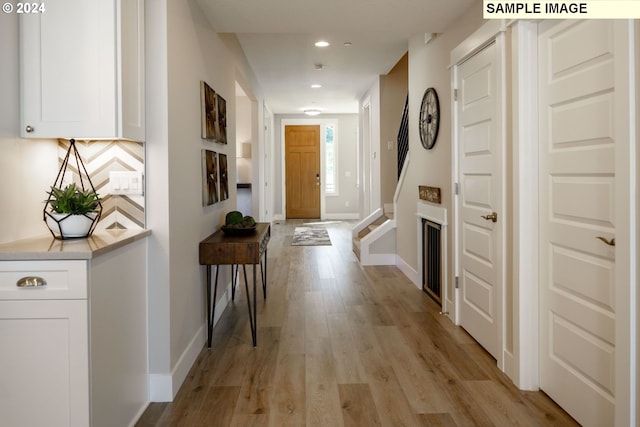 hall featuring light wood-type flooring