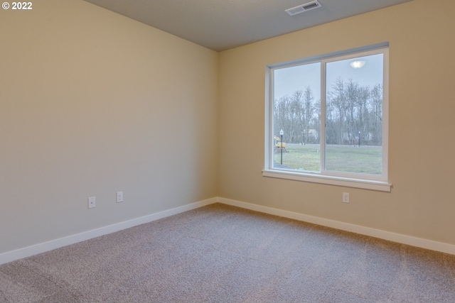 view of carpeted spare room