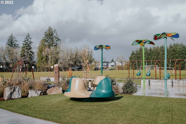 view of jungle gym with a yard