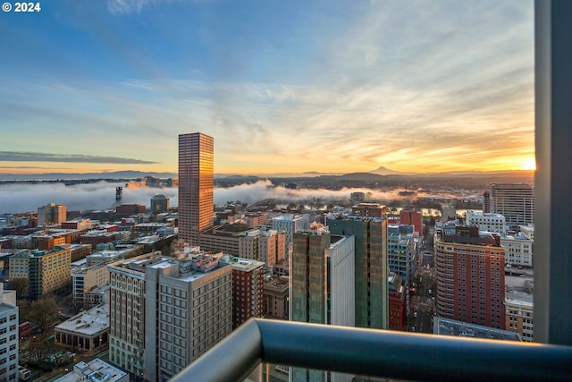 property's view of city featuring a water view