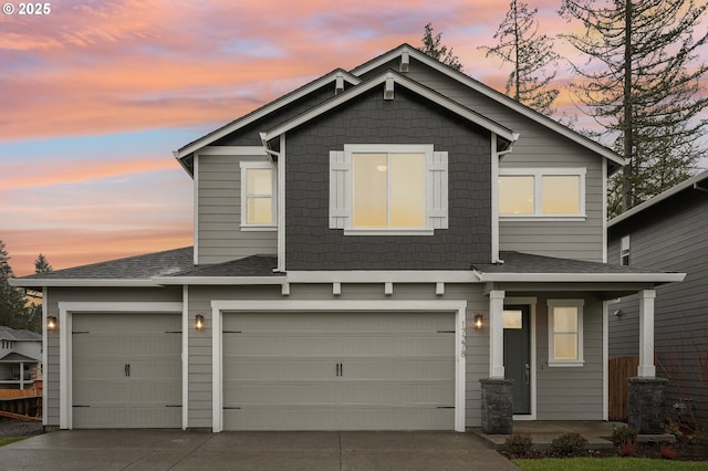 view of front of home with a garage