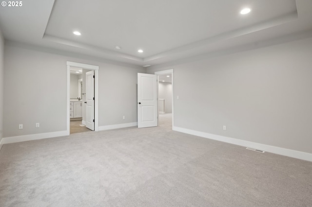 empty room featuring carpet floors and a textured ceiling