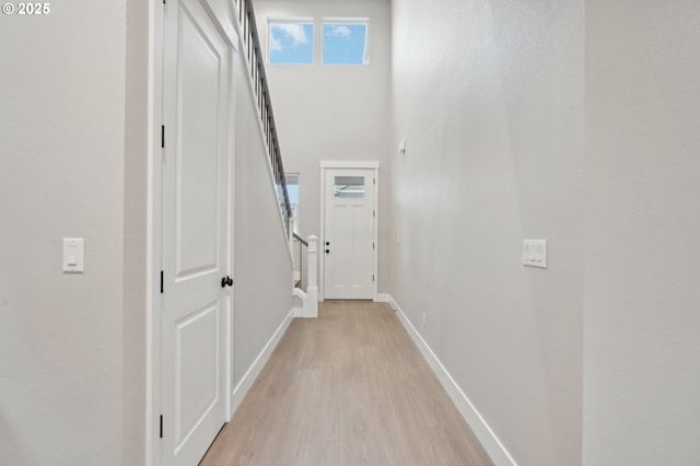 corridor featuring hardwood / wood-style flooring