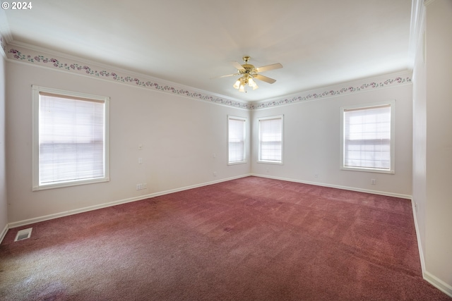 unfurnished room with ceiling fan, carpet floors, a healthy amount of sunlight, and ornamental molding