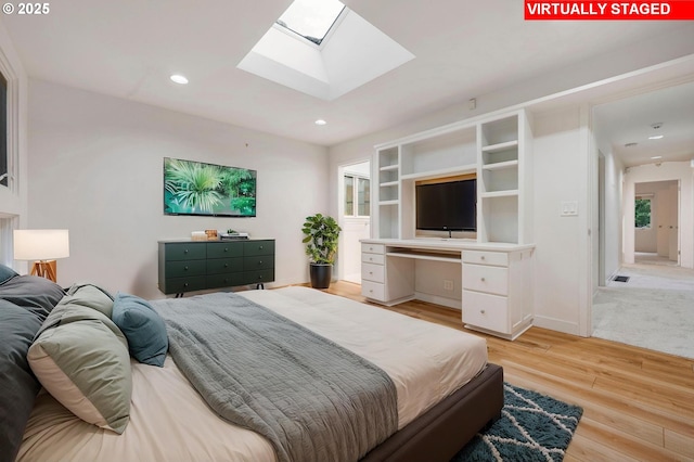 bedroom with light wood-type flooring