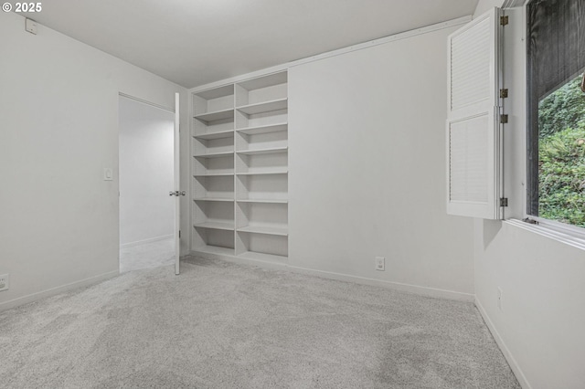 unfurnished bedroom with carpet floors