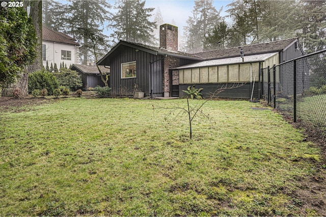 view of yard with a sunroom