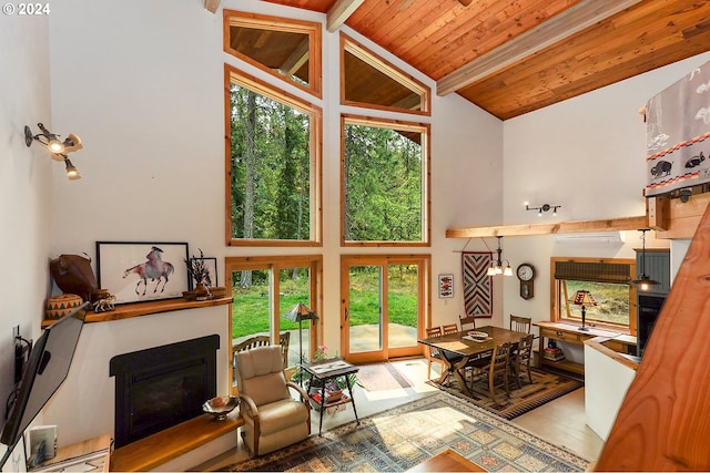 living room with beamed ceiling, high vaulted ceiling, and wooden ceiling