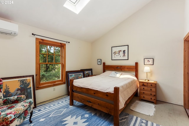 bedroom with an AC wall unit and vaulted ceiling with skylight