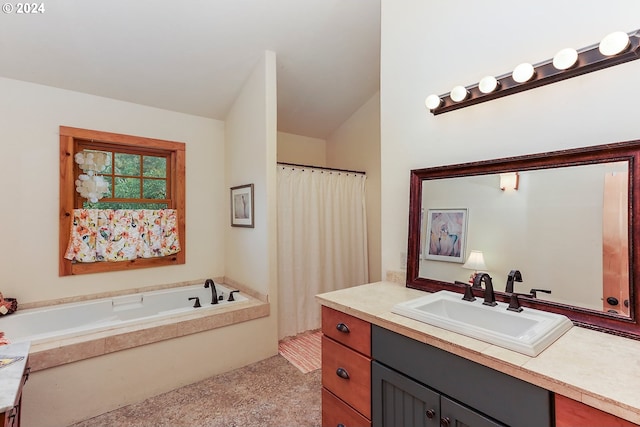 bathroom with a bath and vanity