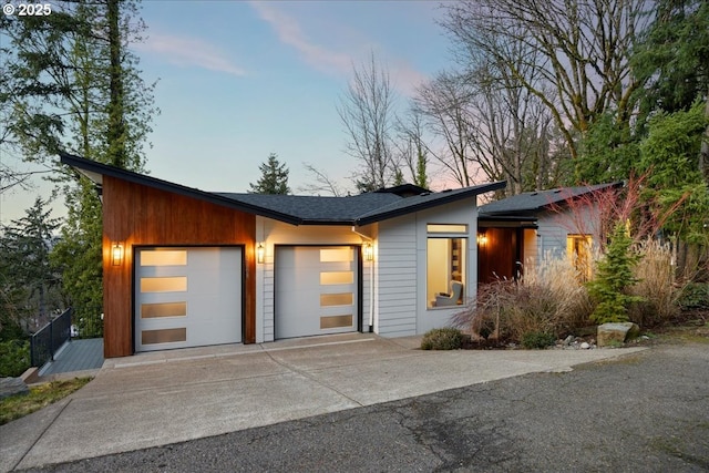 17808 Hillside Way, Lake Oswego, OR 97034 - view of front of property with concrete driveway and a garage
