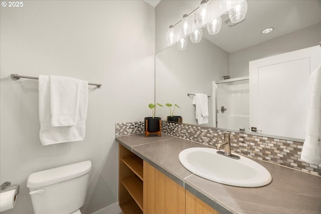 17808 Hillside Way, Lake Oswego, OR 97034 - bathroom with vanity, a shower with shower door, and backsplash