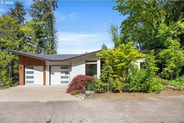 17808 Hillside Way, Lake Oswego, OR 97034 - view of front facade featuring a garage and concrete driveway