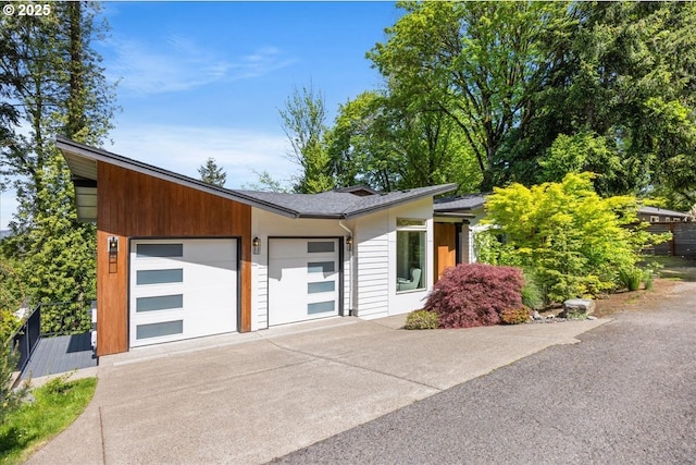 17808 Hillside Way, Lake Oswego, OR 97034 - mid-century inspired home featuring concrete driveway and an attached garage
