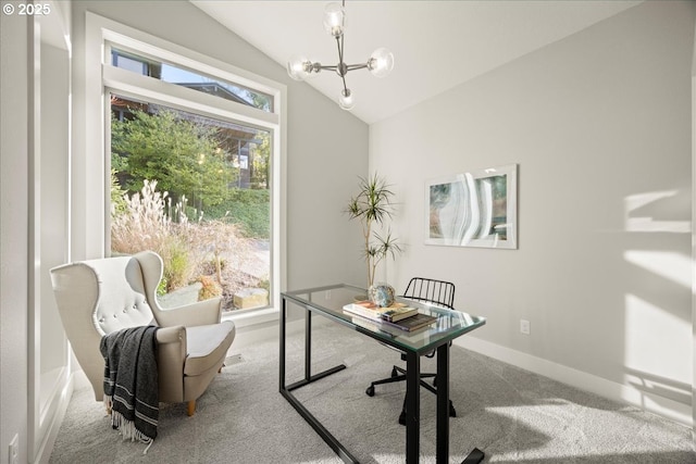 carpeted home office featuring vaulted ceiling and a chandelier