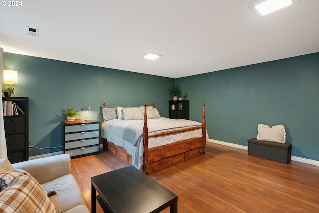 bedroom featuring hardwood / wood-style floors