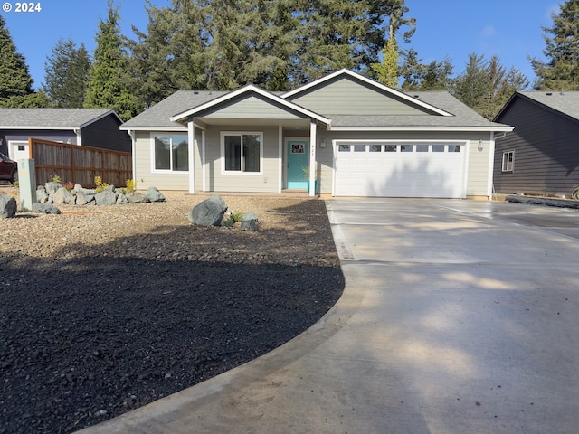 ranch-style home featuring a garage