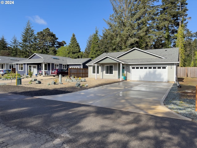 single story home with a garage