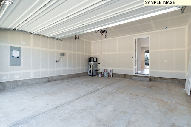 garage featuring a garage door opener and electric panel