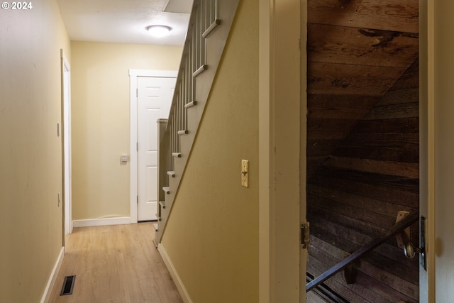 hall with light wood-type flooring