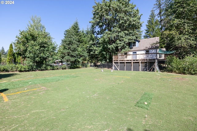 view of yard featuring a deck