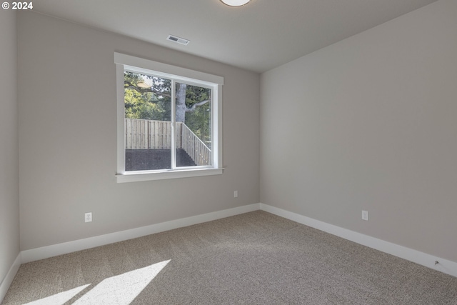 view of carpeted spare room