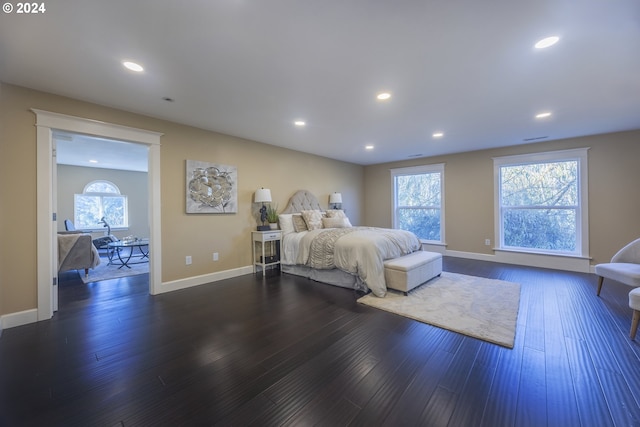 bedroom featuring dark hardwood / wood-style flooring