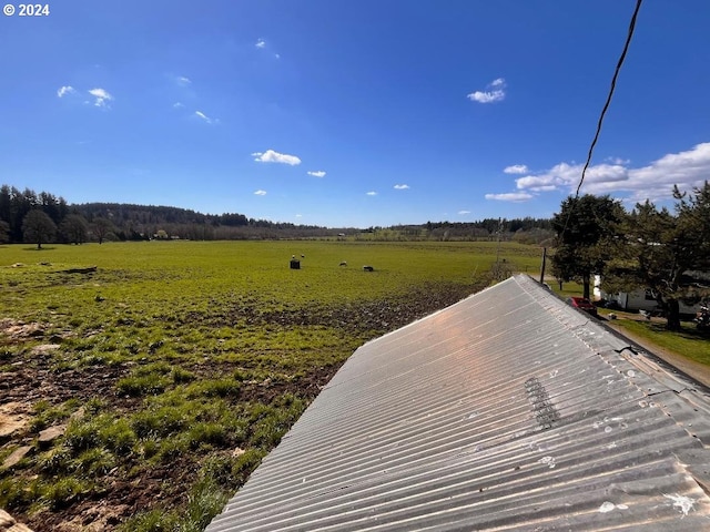 exterior space with a rural view