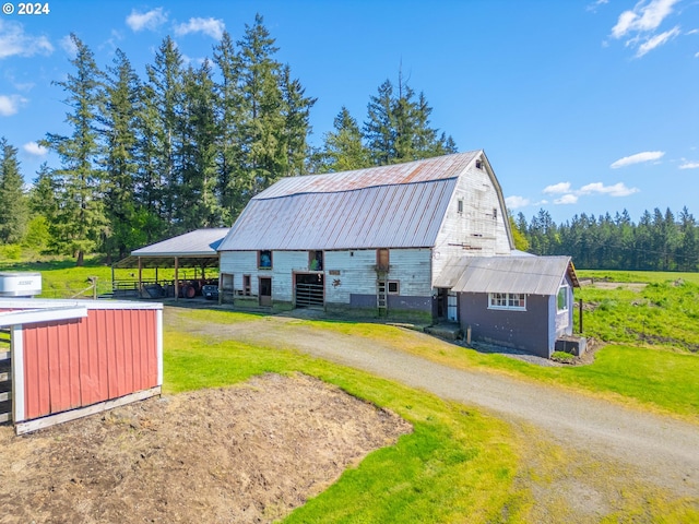 view of shed / structure with a lawn