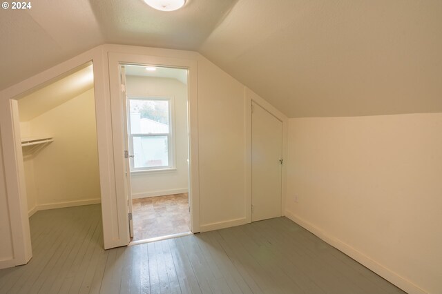 410 N Mountain Blvd, Mount Vernon, OR 97865 - additional living space featuring light wood-style floors, baseboards, and vaulted ceiling