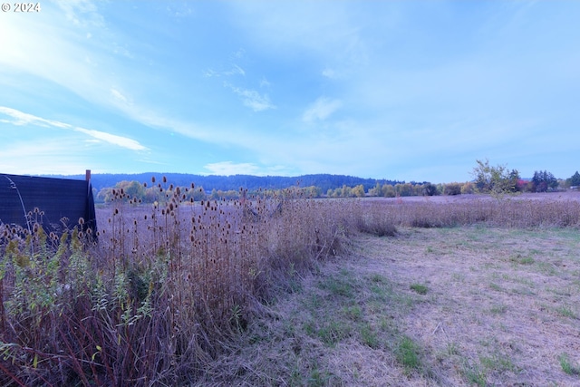 view of mountain feature featuring a rural view