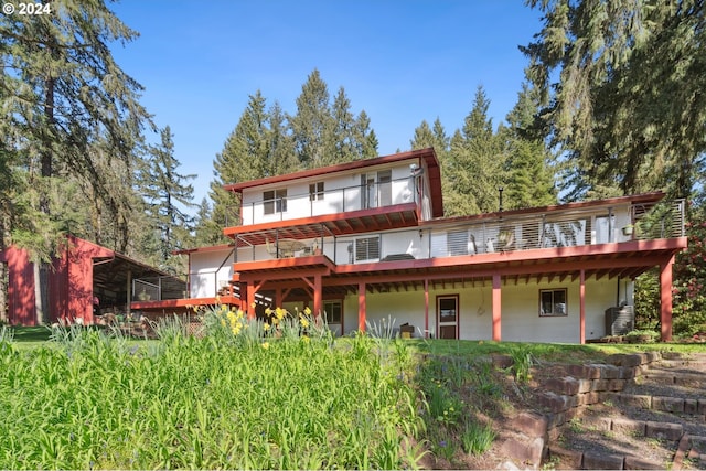 view of front of home featuring central air condition unit