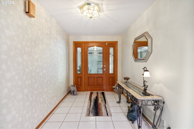 entryway featuring light tile floors