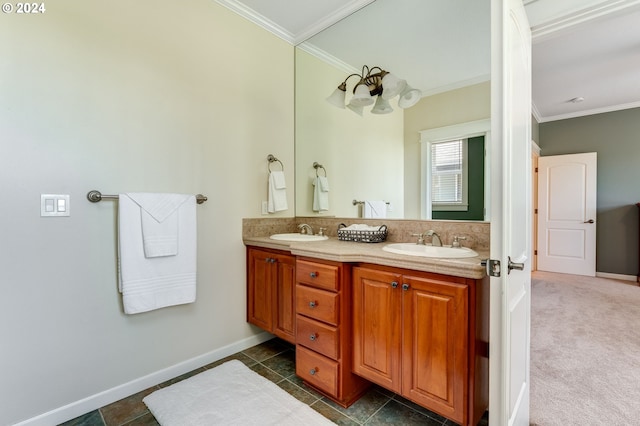 bathroom with crown molding and vanity