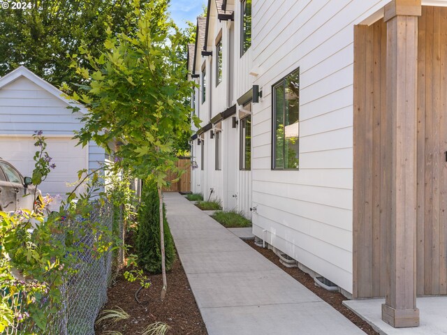 exterior space featuring an outbuilding and a garage