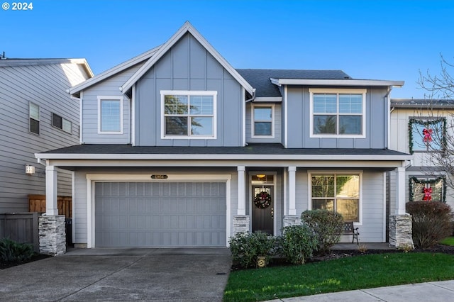 view of front of property with a garage