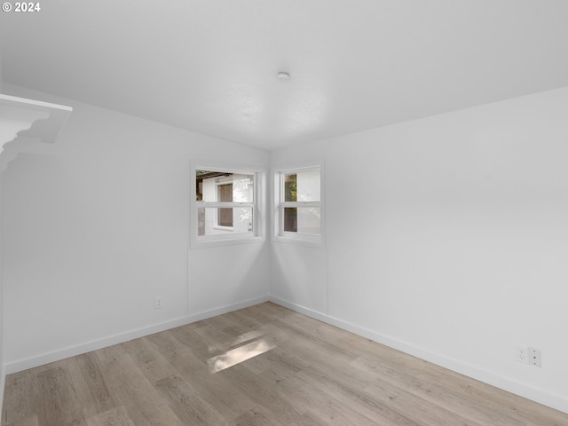 empty room with light wood-type flooring