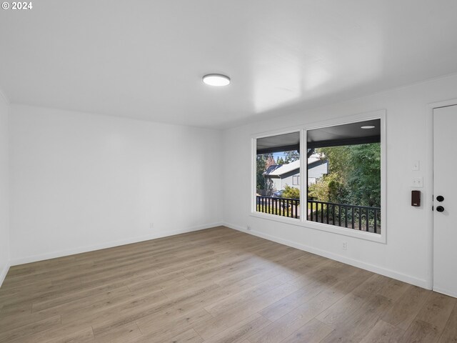 empty room featuring light hardwood / wood-style floors