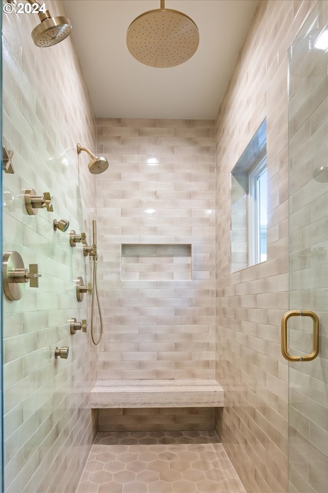 bathroom featuring an enclosed shower