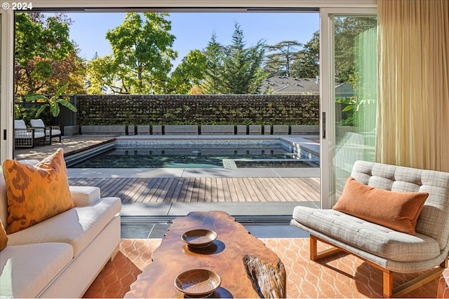 view of pool with a wooden deck