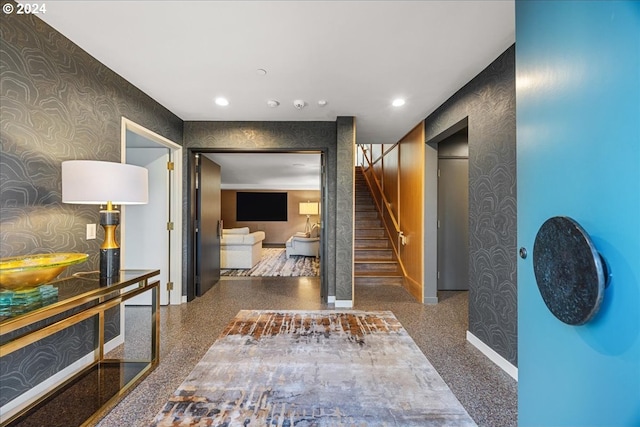 1933 Highlands Loop, Lake Oswego, OR 97034 - hall with wallpapered walls, stairs, speckled floor, and recessed lighting