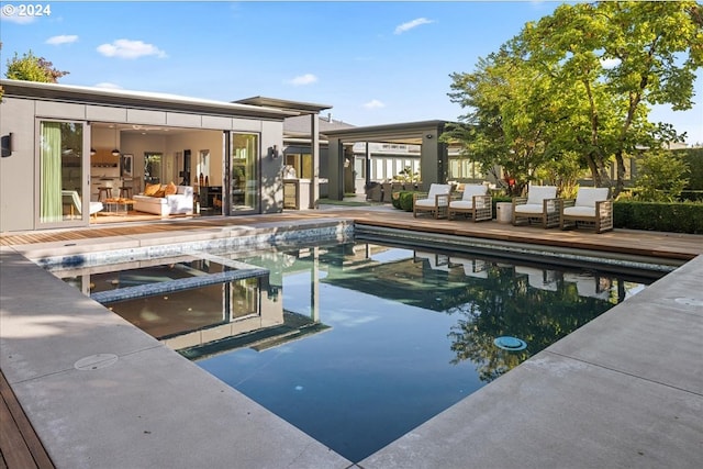 view of swimming pool with a patio area