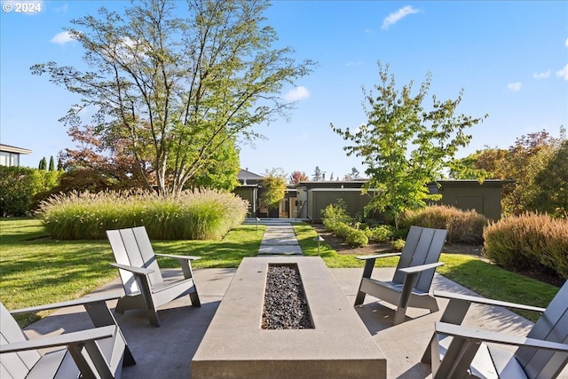 view of patio with an outdoor fire pit