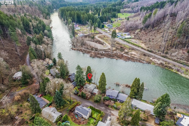 drone / aerial view with a water view