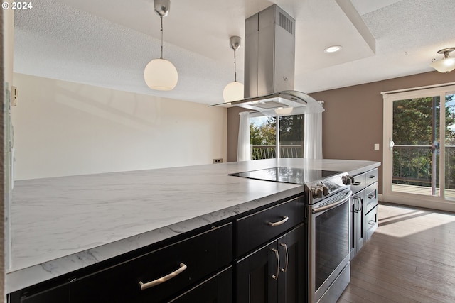 kitchen with island range hood, electric stove, a textured ceiling, hanging light fixtures, and light hardwood / wood-style floors