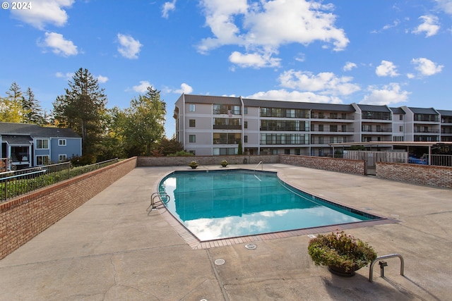 view of pool with a patio area