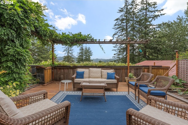 view of patio / terrace featuring a wooden deck and an outdoor hangout area