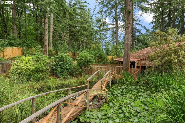 view of yard with a wooden deck