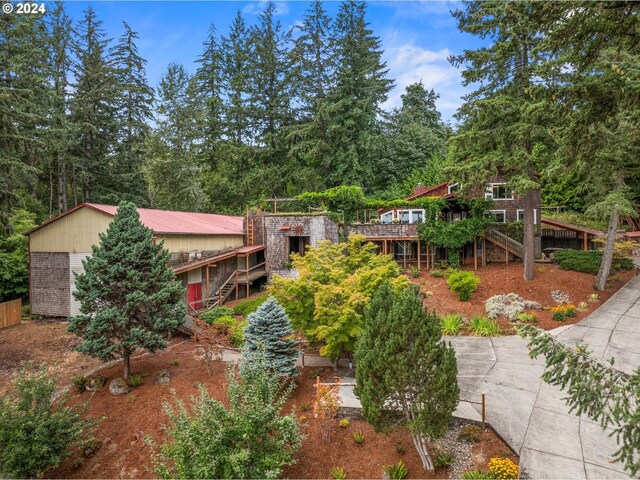 view of yard featuring a wooden deck